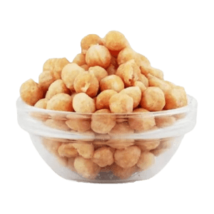 The picture displays a glass bowl full of butterscotch nuts
