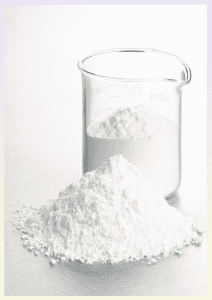 The image shows a beaker of ice cream stabiliser adjacent to which is a mount of ice cream stabiliser